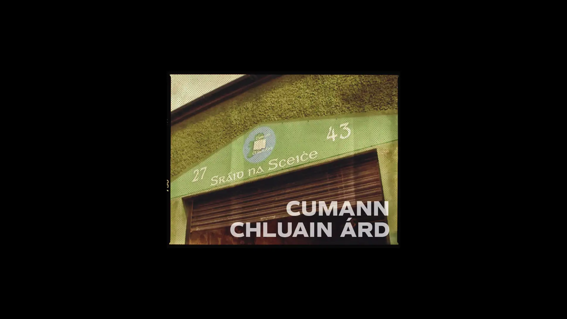 A building facade featuring the name Cumann Chluain Árd, highlighting creative brand development and local identity design elements.