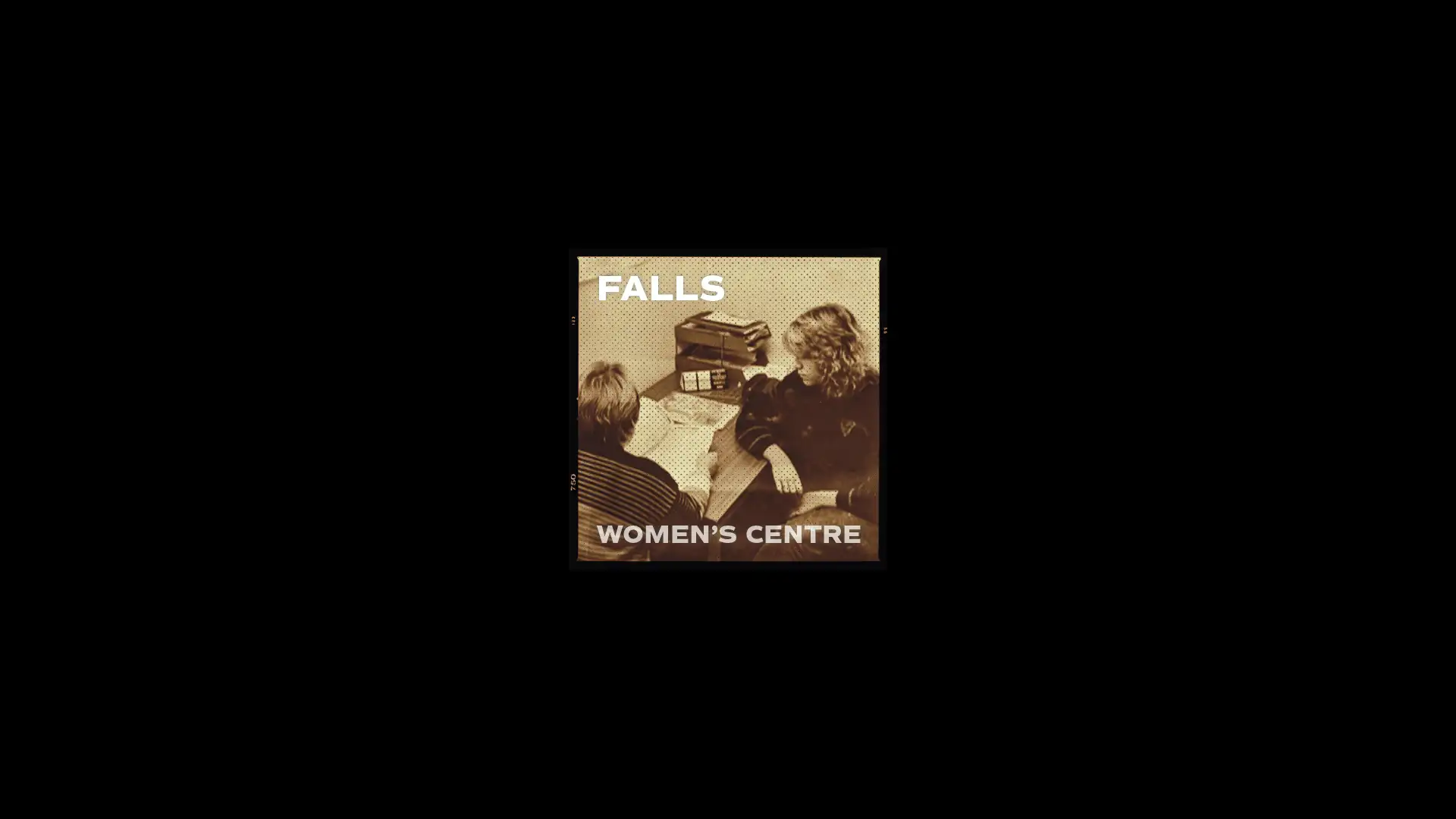 Vintage photo for Falls Women’s Centre 1982-2009, showing two women working at a desk, highlighting our brand development and archival design work.