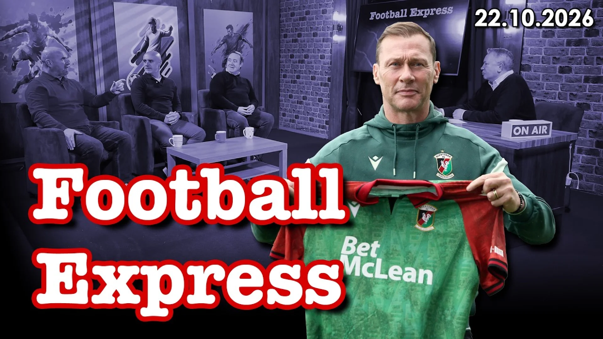 A man holds a green and red football jersey on the Football Express studio set, highlighting sports brand development and media strategy.